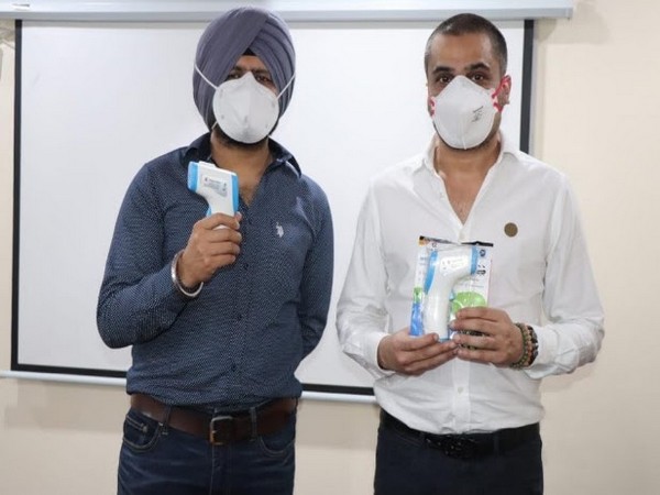 Maninder Singh and Arjun Prasad (Bal Bharti Foundation) with Make in India InfraRed Thermometer