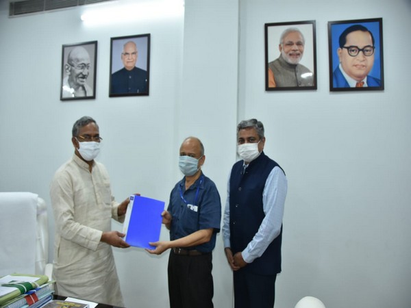 Civil Aviation Ministry Secretary Pradeep Khairola and Airports Authority of India Chairman Arvind Singh submitting the pre-feasibility report to Chief Minister Trivendra Singh Rawat. 