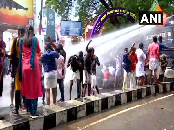 Thiruvananthapuram: Police use water cannon against BJP Yuva Morcha members protesting outside Kerala Assembly. (Photo/ANI)