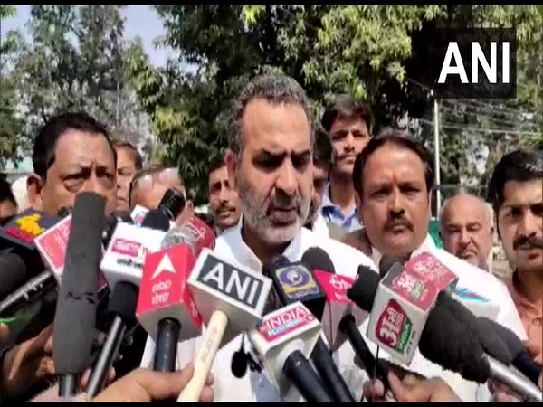 Sanjeev Balyan, Union Minister of State for Animal Husbandry and Muzaffarnagar MP speaking to media. (Photo/ANI)