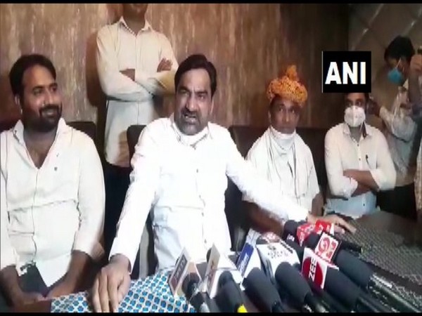 RLP MP Hanuman Beniwal speaks to reporters in Jodhpur on Friday. (Photo/ANI)