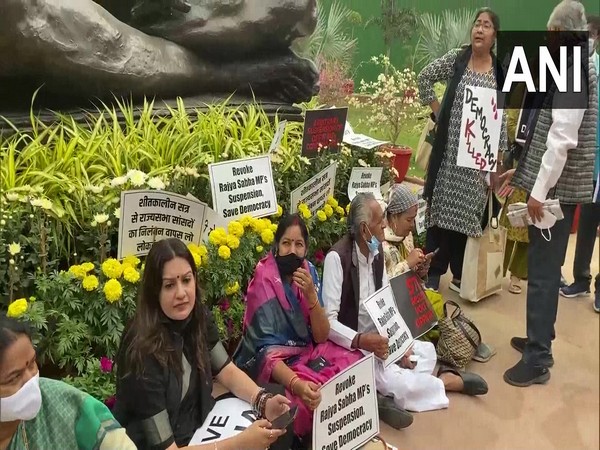 Suspended Rajya Sabha MPs on Wednesday sat on a protest near Gandhi statue inside Parliament premises