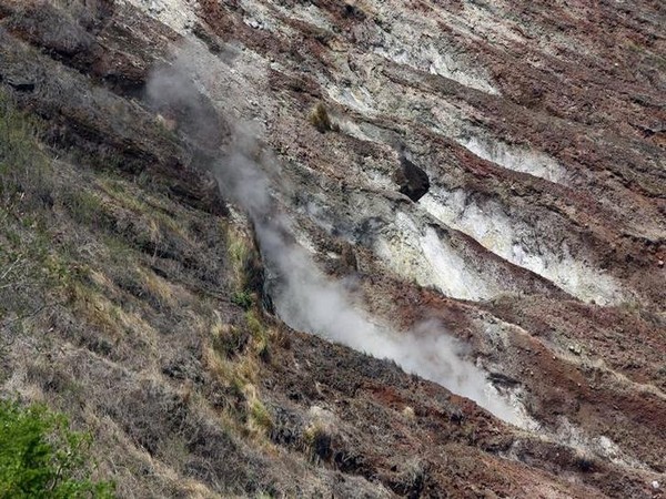 Steam of sulphuric gases rises from the crater of Taal Volcano
