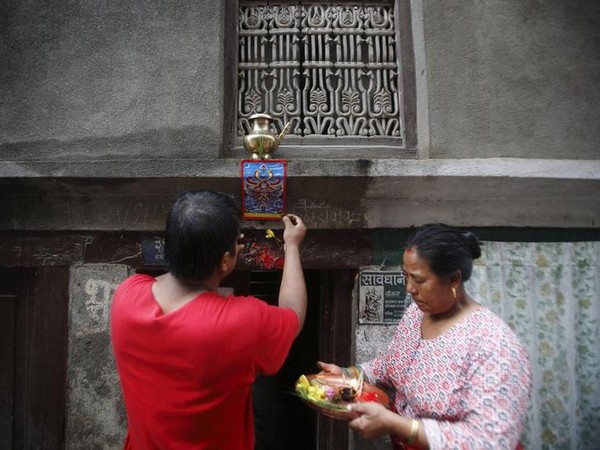 Devotees marking Naag Panchami in Kathmandu in 2012 (Photo/Reuters) 