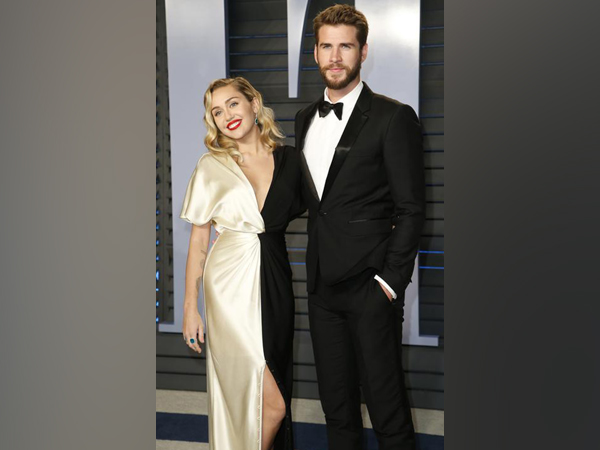 Miley Cyrus  and Liam Hemsworth.