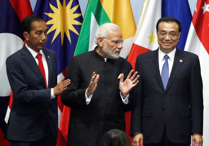India's Prime Minister Narendra Modi with China premier Li Keqiang and  Indonesia's President Joko Widodo at RCEP meeting in Singapore in 2018