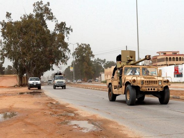 A military vehicle of Misrata forces, under the protection of Tripoli's forces, is seen on the road of Wadi al Rabih south of Tripoli, Libya
