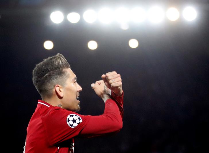 Roberto Firmino celebrates after scoring a goal against FC Porto