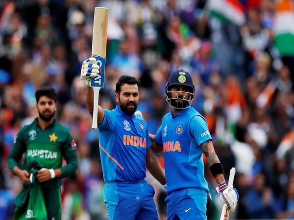 Rohit Sharma celebrating his ton with Virat Kohli against Pakistan
