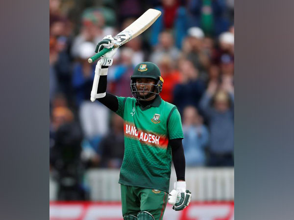 Shakib Al Hasan celebrating after scoring century against West Indies.