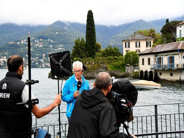 Media awaiting arrival of the Obama family to Villa Oleandra, the home of American star George Clooney, in the northern Italian lakefront hamlet of Laglio