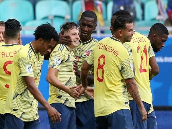 Colombian players celebrating after scoring goal against Paraguay
