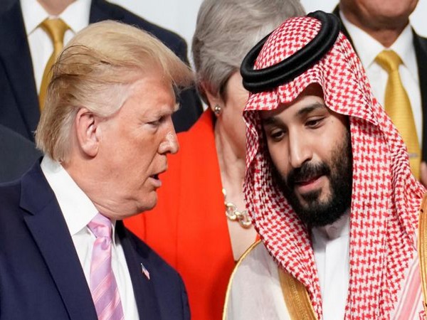 U.S. President Donald Trump speaks with Saudi Arabia's Crown Prince Mohammed bin Salman during family photo session with other leaders and attendees at the G20 leaders summit in Osaka (File Image)