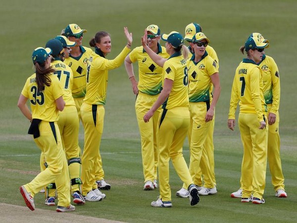 Australia's Jess Jonassen celebrating with team mates after taking the wicket of England's Fran Wilson on Tuesday