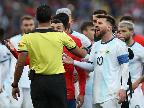 Argentina's Lionel Messi reacts after being shown a red card by referee Mario Diaz de Vivar