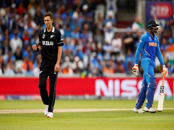 New Zealand's Trent Boult celebrates the wicket of India's Ravindra Jadeja