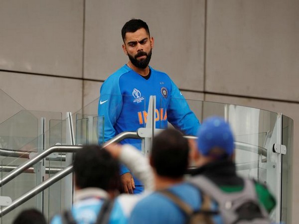 Dejected Virat Kohli after New Zealand beat India