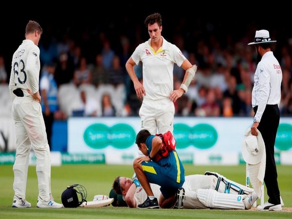 ustralia's Steve Smith receives treatment as he lays on the floor after being hit by a ball from England's Jofra Archer