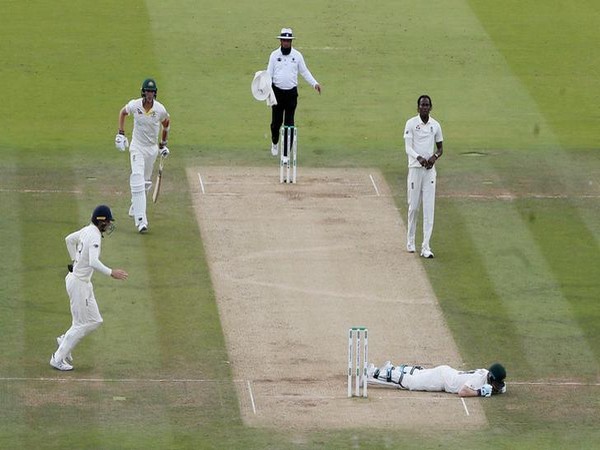 Australia's Steve Smith lays on the floor after being hit by a ball from England's Jofra Archer