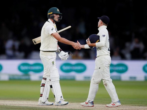 Australia's Pat Cummins and England's Rory Burns shake hands at the end of play as the second test ends in a draw 