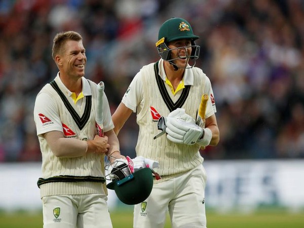 Australia's David Warner (left) and Marnus Labuschagne (right) 