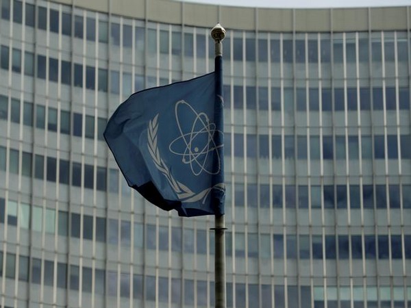 The flag of the International Atomic Energy Agency (IAEA) flutters in front of its headquarters in Vienna, Austria