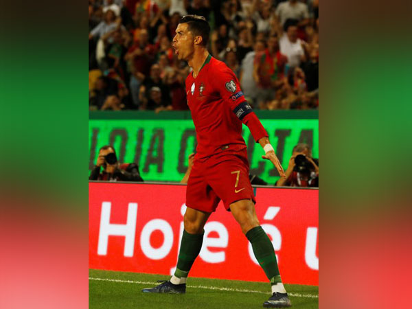 Portugal's Cristiano Ronaldo celebrates after scoring goal against Luxembourg 