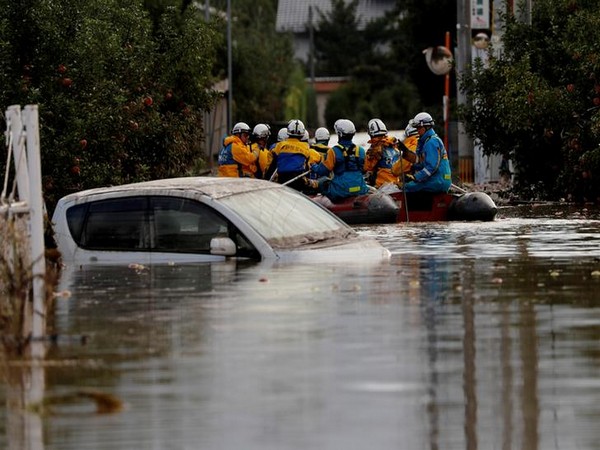 Rescue workers search a flooded area in the aftermath of Typhoon Hagibis, which caused severe floods at the Chikuma River in Nagano, Japan. Photo/ANI