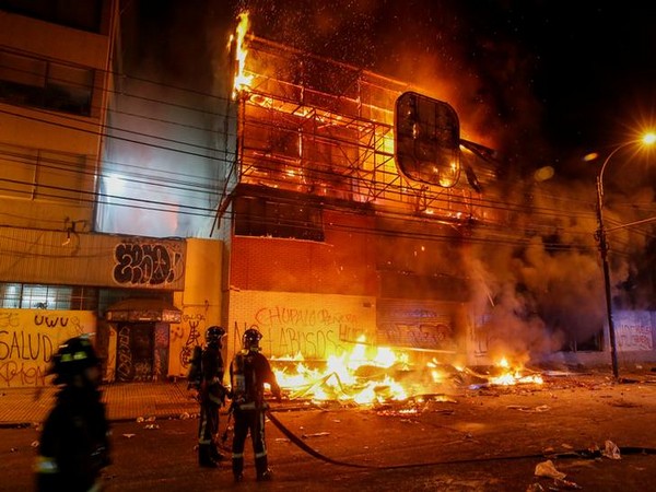 Visuals of fire in a supermarket in Santiago on Saturday. Photo/Reuters