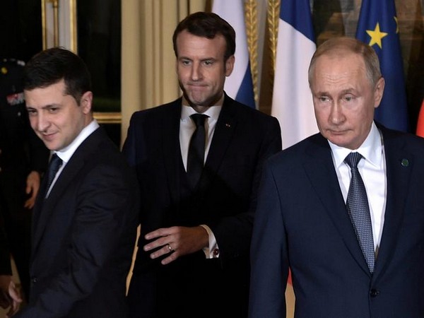 Russian President Vladimir Putin, French President Emmanuel Macron and Ukrainian President Volodymyr Zelenskiy attend a Normandy-format summit in Paris,