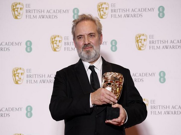 Film director Sam Mendes poses with his award for Best Film for '1917' at the British Academy of Film and Television Awards (BAFTA) at the Royal Albert Hall in London on Sunday.