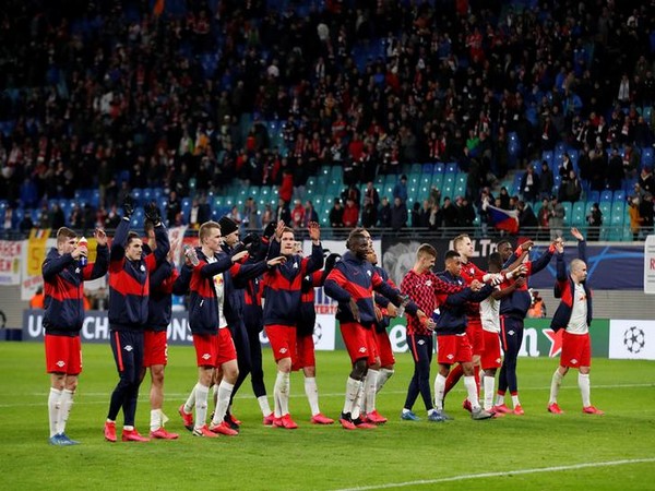 RB Leipzig players celebrate after the match 