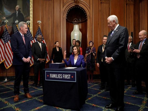 U.S. House Speaker Nancy Pelosi (D-CA) is flanked by House Minority Leader Kevin McCarthy
