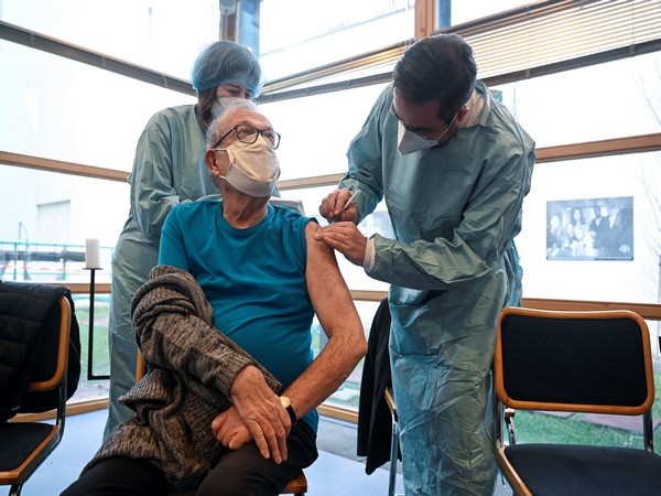 A holocaust survivor receives COIVD-19 vaccine in Bratislava, Slovakia (Photo credit: Reuters)