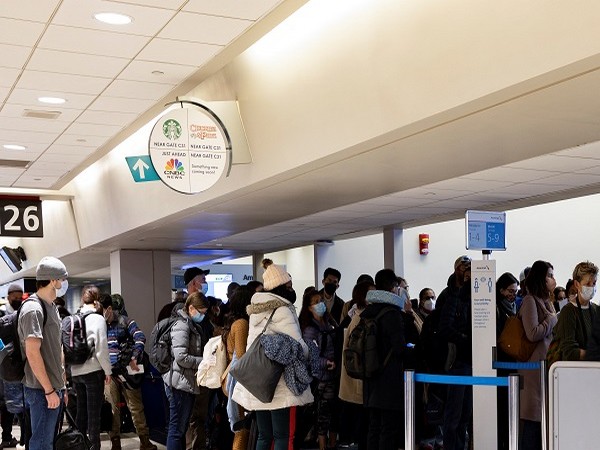 Travelers wait to board a flight at the Philadelphia International Airport (PHL) in Philadelphia, Pennsylvania, U.S., December, 23 2021. (Photo Credit: REUTERS)