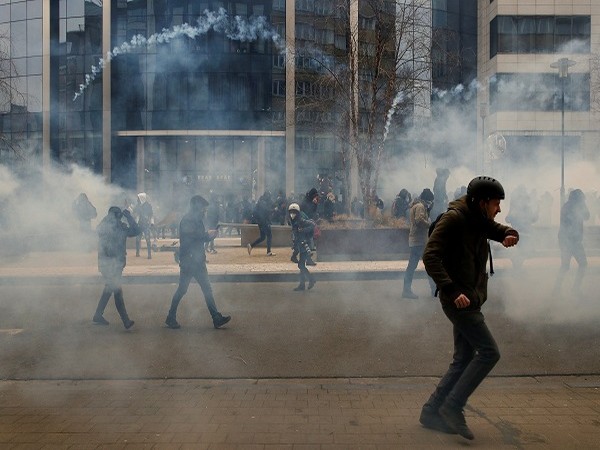Protesters react during a demonstration against the Belgian government's COVID restrictions in Brussels. (Photo Credit: REUTERS)