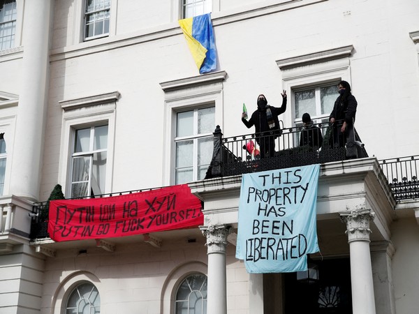 Squatters occupy a mansion, reportedly belonging to Russian billionaire Oleg Deripaska, who was placed on Britain's sanctions list last week (Pic credits: Reuters)