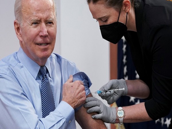 US president Joe Biden gets his 2nd COVID-19 booster shot (Photo Credit: Reuters)