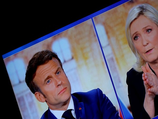 Macron during the debates with his opponent, Marine Le Pen (Photo Credit - Reuters)