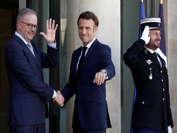 French President Emmanuel Macron shakes hands with Australian Prime Minister Anthony Albanese at the Elysee Palace in Paris, France, July 1. (Photo Credit: REUTERS)