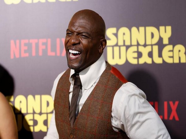 Actor Terry Crews posing at a premiere for the Netflix original film 'Sandy Wexler'