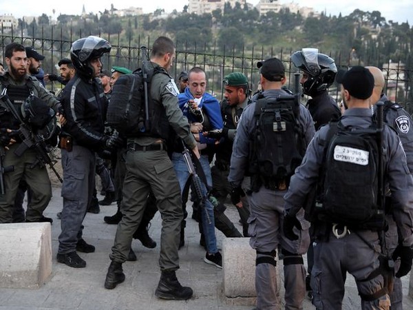 A Palestinian demonstrator detained by Israeli police in Al-Aqsa mosque in East Jerusalem.