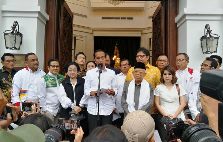 President Joko Widodo talks to reporters about the results of the Presidential elections in Indonesia