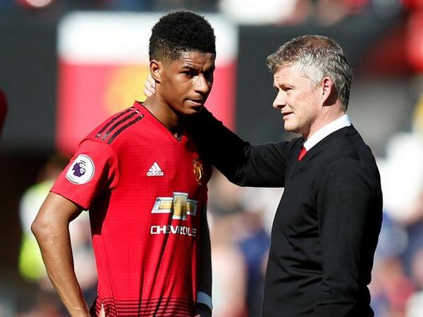 Manchester Unity manager Ole Gunnar Solskjaer (right) with Marcus Rashford (left) 