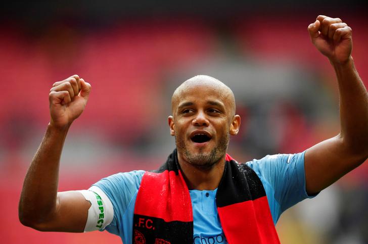 Manchester City's Vincent Kompany celebrates after winning the FA Cup