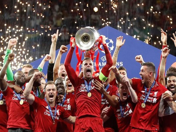 Liverpool FC with the Champions League trophy
