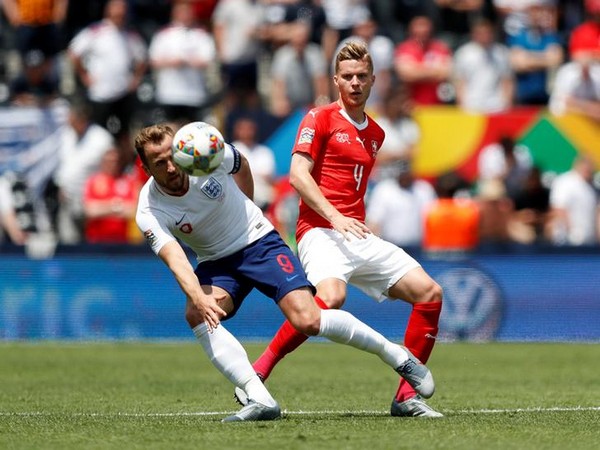 England's Harry Kane in action with Switzerland's Nico Elvedi 