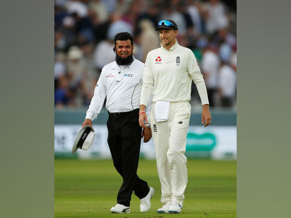 England Test skipper Joe Root with umpire Aleem Dar