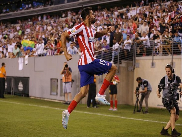 Atletico Madrid's Diego Costa celebrates after scoring goal against Real Madrid 