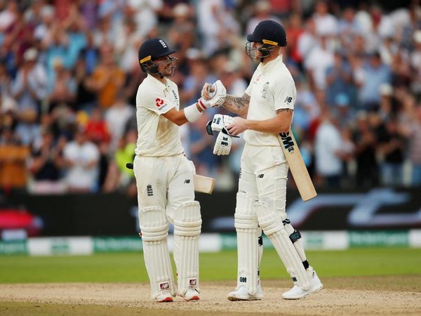 England's Rory Joseph Burns (left) with Ben Stokes (right) 